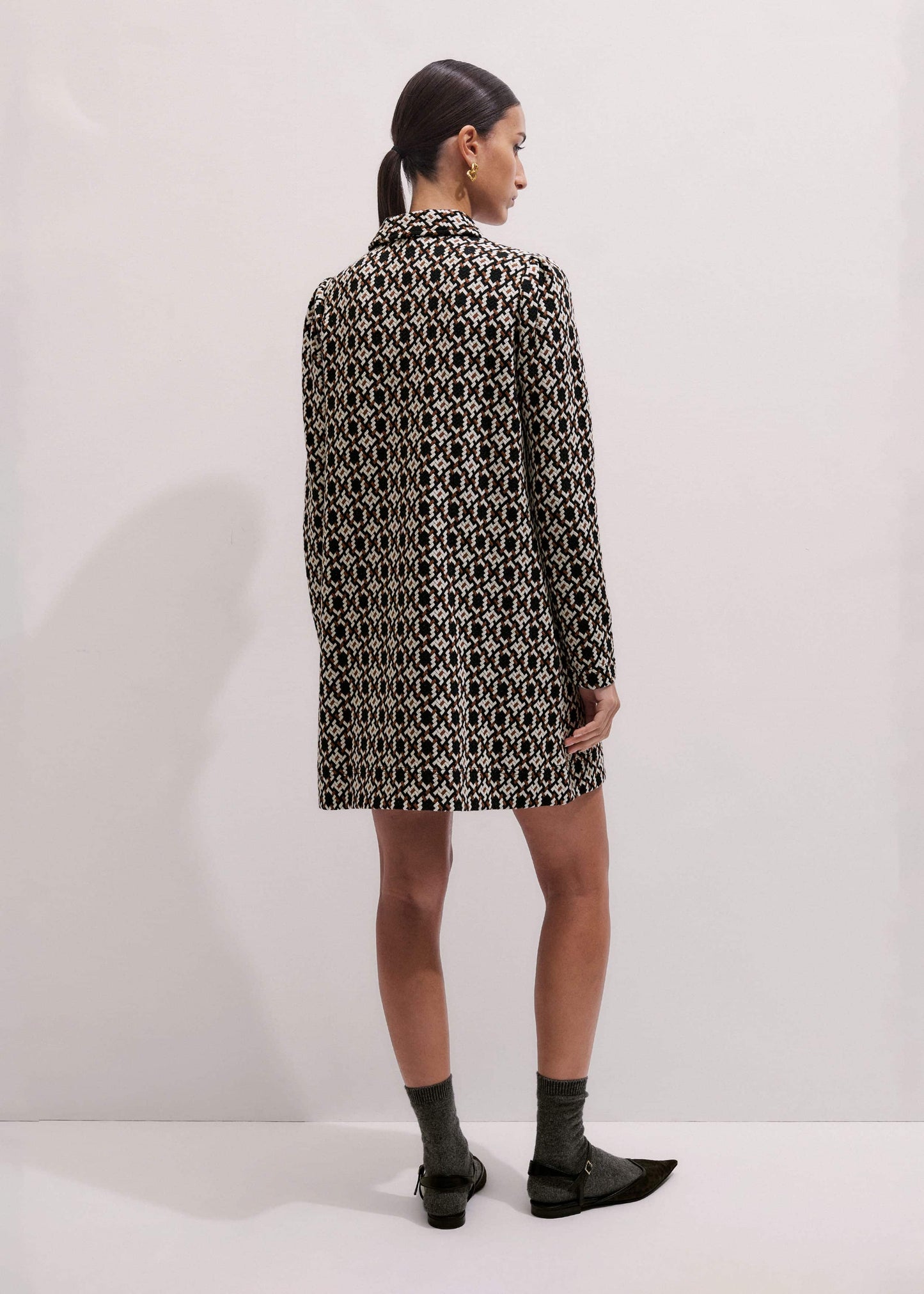 ME and EM Clothing ME+EM's Navy Graphic Jacquard Short A-Line Dress is crafted from soft jersey in a graphic blend of colors. Shop now.
