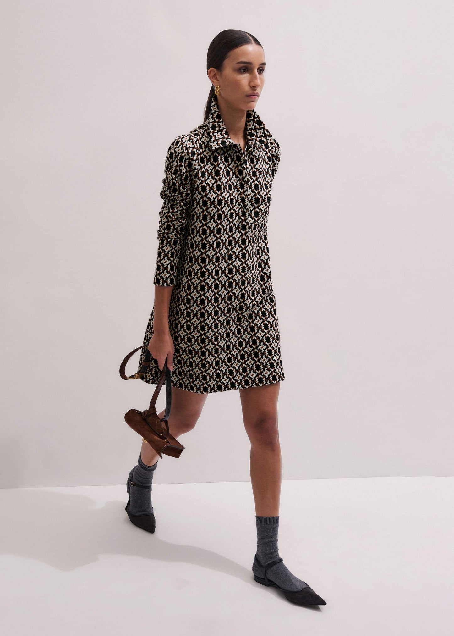 ME and EM Clothing ME+EM's Navy Graphic Jacquard Short A-Line Dress is crafted from soft jersey in a graphic blend of colors. Shop now.