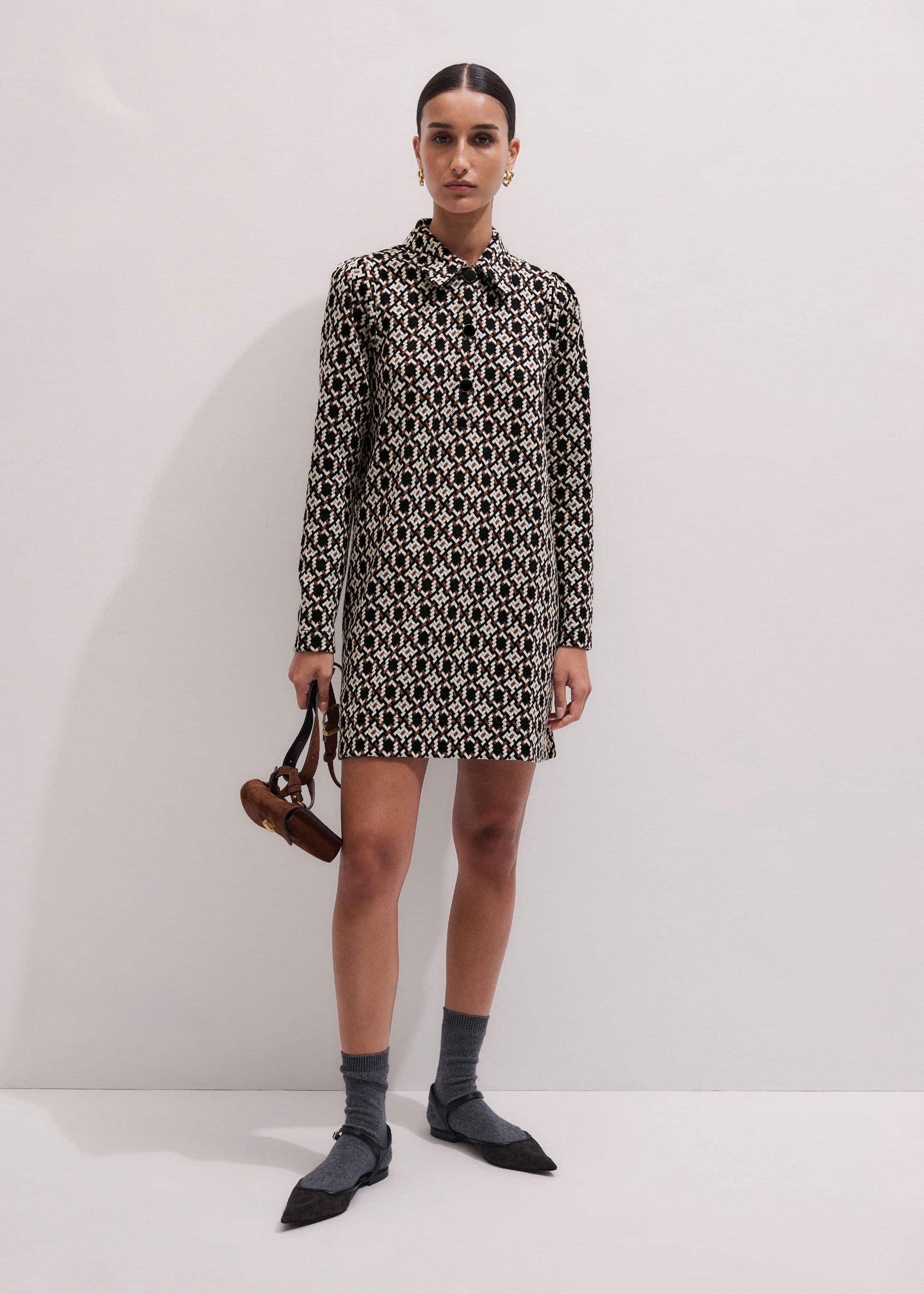 ME and EM Clothing ME+EM's Navy Graphic Jacquard Short A-Line Dress is crafted from soft jersey in a graphic blend of colors. Shop now.